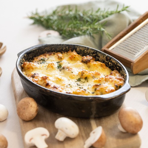 Cheesy baked gnocchi with chicken and mushrooms for 1 person (500 g)